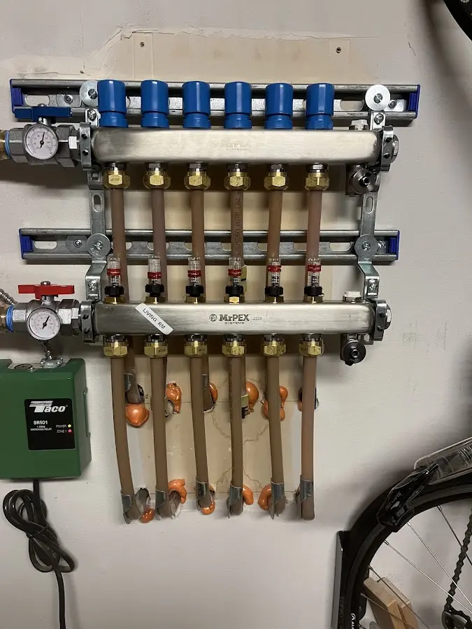 Plumber performing Water Heater Repair at a residential property in Leander